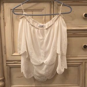 sleeveless white top